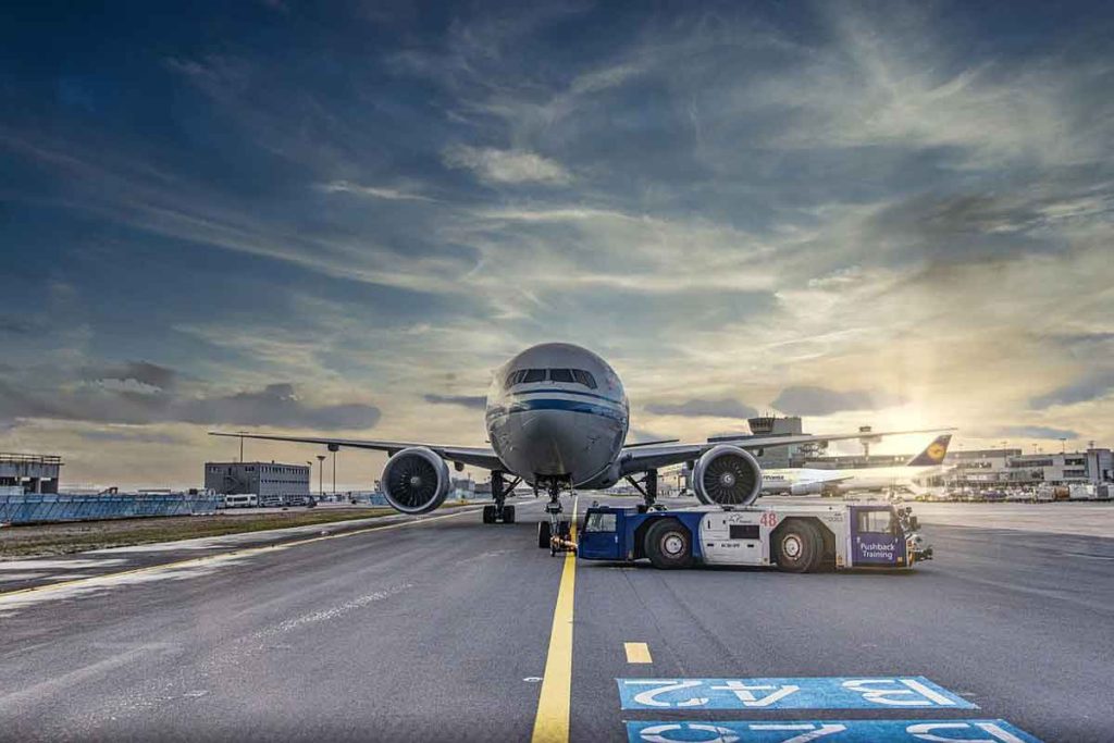 An aircraft preparing for takeoff, representing flexible charter flight services for group or mission-based travel